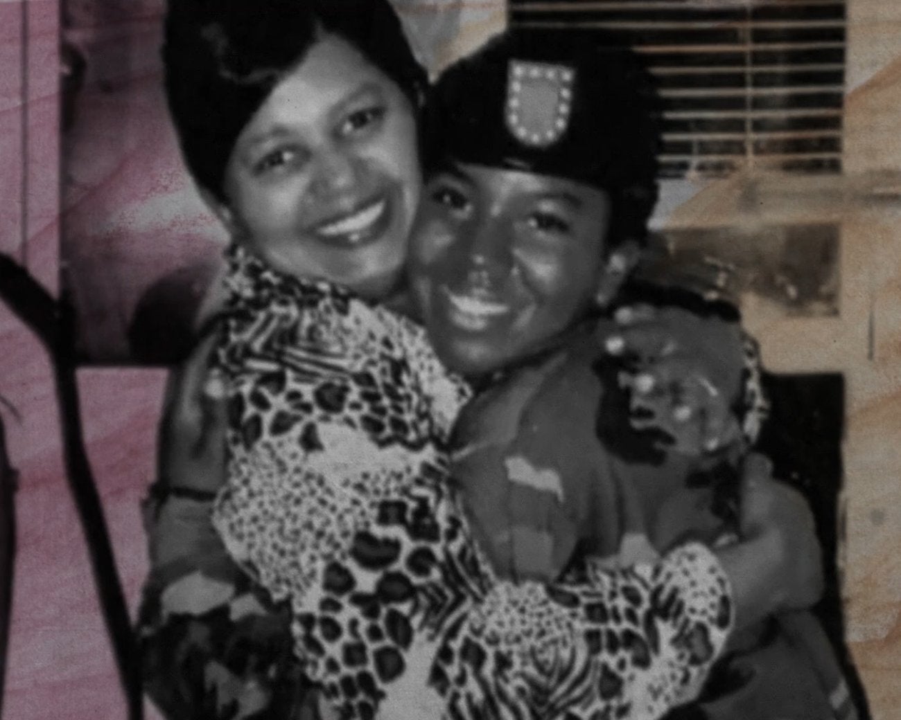 Image of Latina mother hugging her daughter a service member 