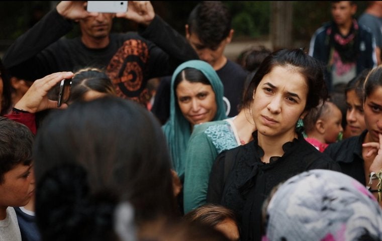 Image of Nadia Murad, Nobel prize winner and advocate for Yezidi women, from the film "On Her Shoulders" by Alexandria Bombach.