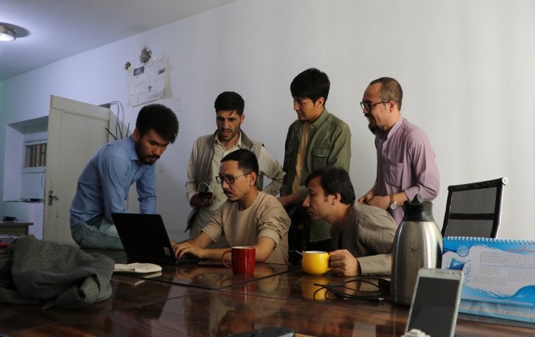 Image of journalists in ETILAAT ROZ newsroom in Afghanistan